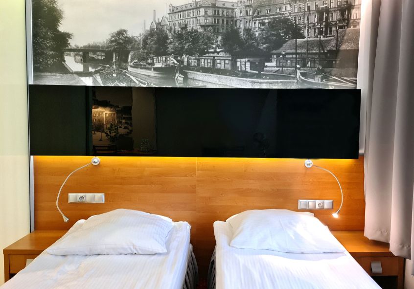 Łóżko w pokoju typu standard w hotelu w Gliwicach